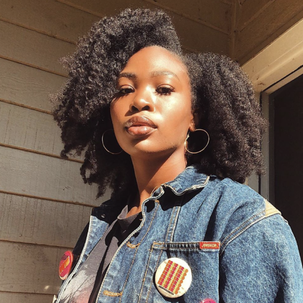 girl with vote buttons