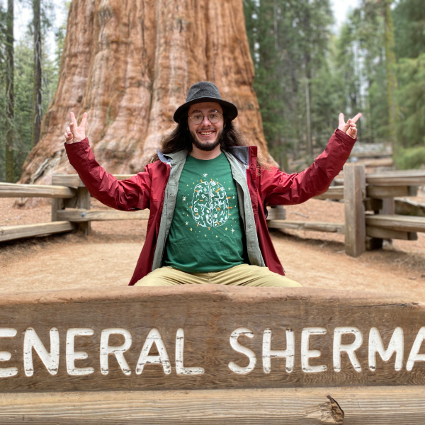 guy in front of tree