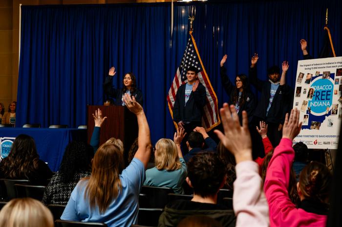 speaking at a rally