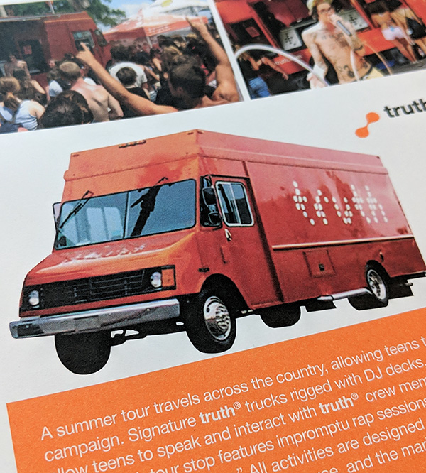 Orange Truth campaign truck displayed in a brochure, with photos of teens gathered around branded trucks at outdoor events.
